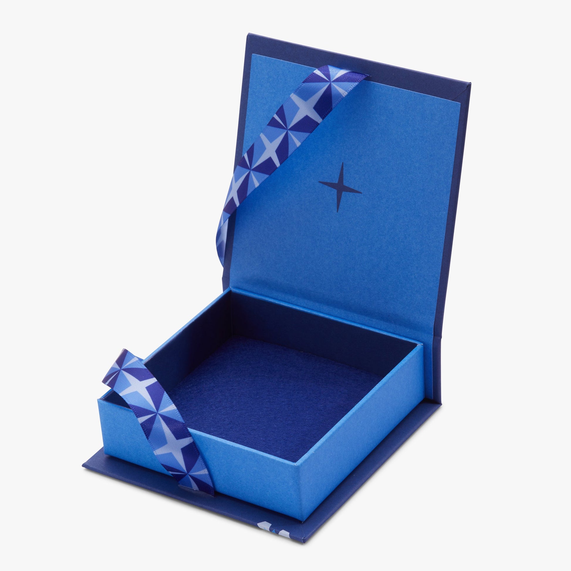 Holiday Bow Gift Box by ALEX AND ANI, blue gift box with star-patterned ribbon and open lid on Tampa Home & Garden Store