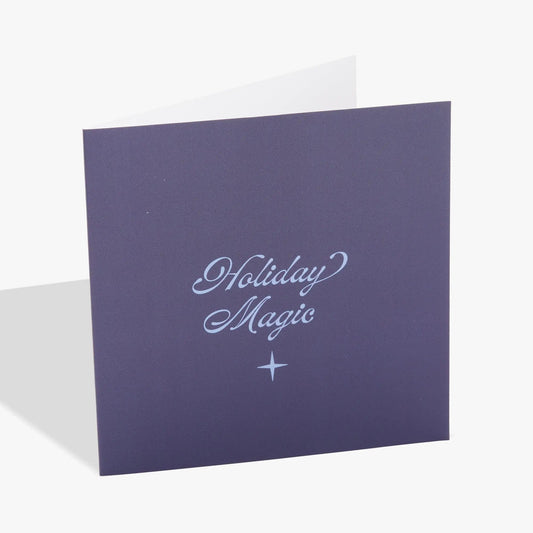 Holiday greeting card with a purple textured cover and white interior text Holiday Magic on Tampa Home & Garden Store