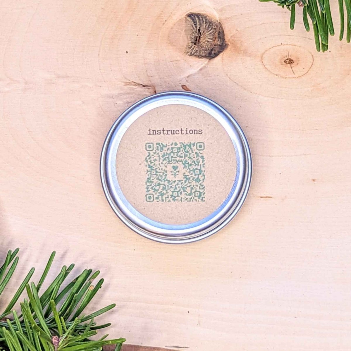Holiday Seed Ornament seeds tin by Plantflix with QR code on round metal lid on Tampa Home & Garden Store