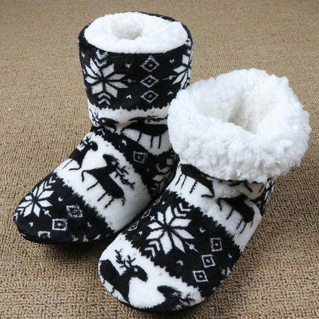 Stevvex women's winter slippers pair in black and white elk pattern with plush fur lining on Tampa Home & Garden Store
