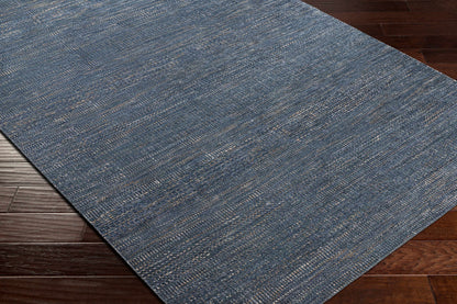 Hoole Area Rug Boutique Rugs blue gray woven texture on dark hardwood floor on Tampa Home & Garden Store