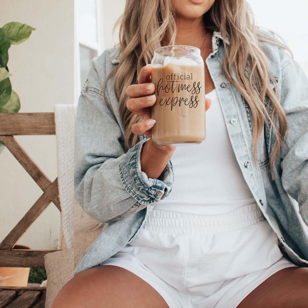 Hot Mess 17oz travel mug Gia Roma with official hot mess express text in hand on Tampa Home & Garden Store