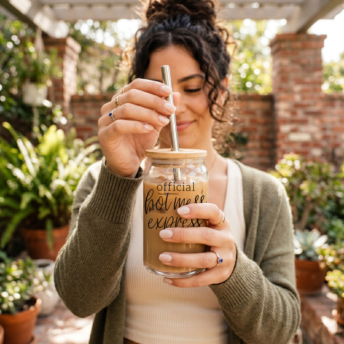 Hot Mess 17oz travel mug in clear glass jar with light wood lid and metal straw on Tampa Home & Garden Store