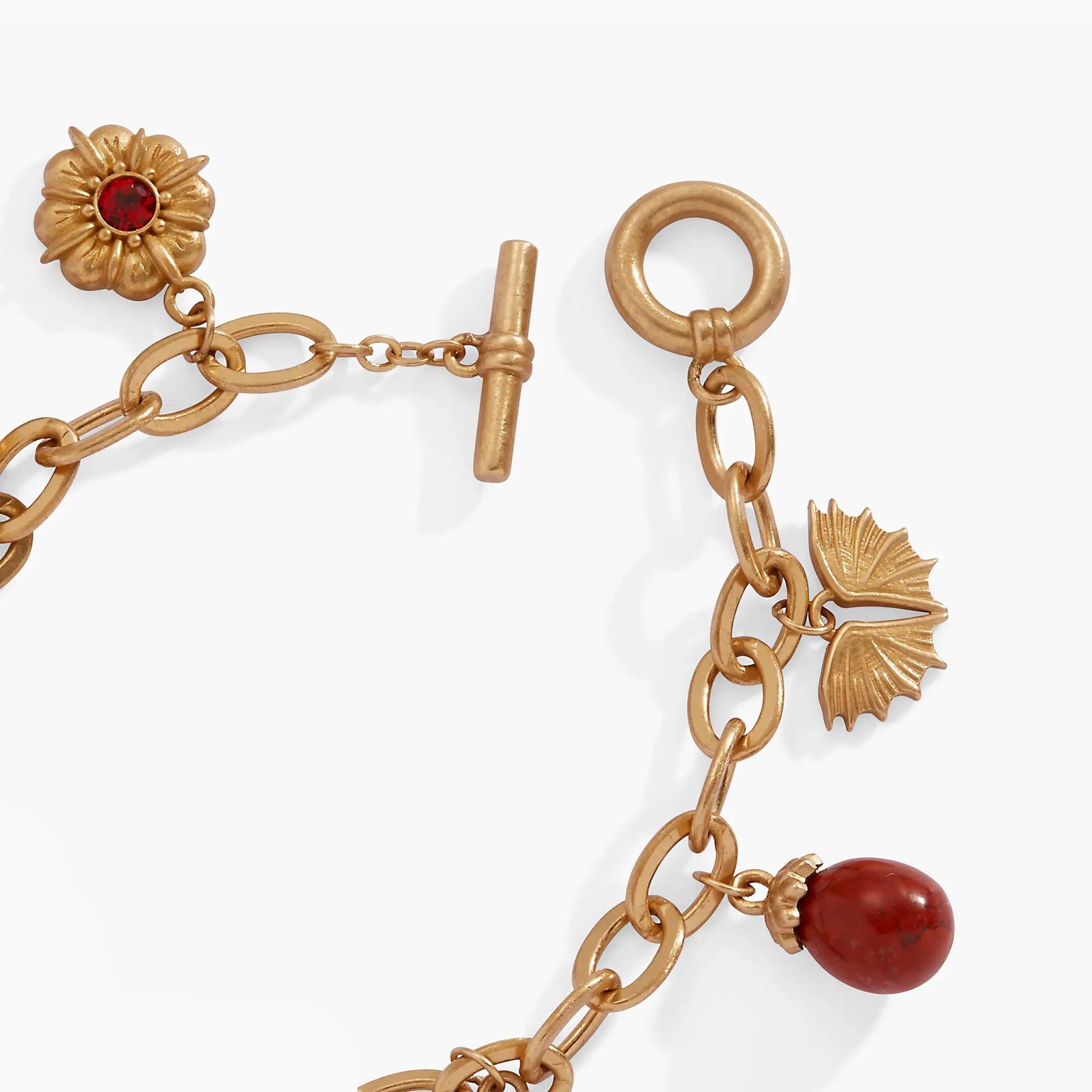 House of the Dragon Toggle Multi-Charm Bracelet gold-tone with red gemstone flower charm on Tampa Home & Garden Store
