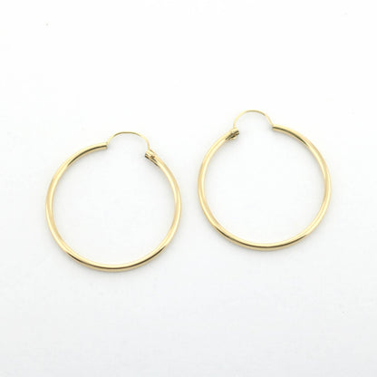 14k yellow gold filled hoop earrings 24 mm, partial view of two hinged hoops on Tampa Home & Garden Store