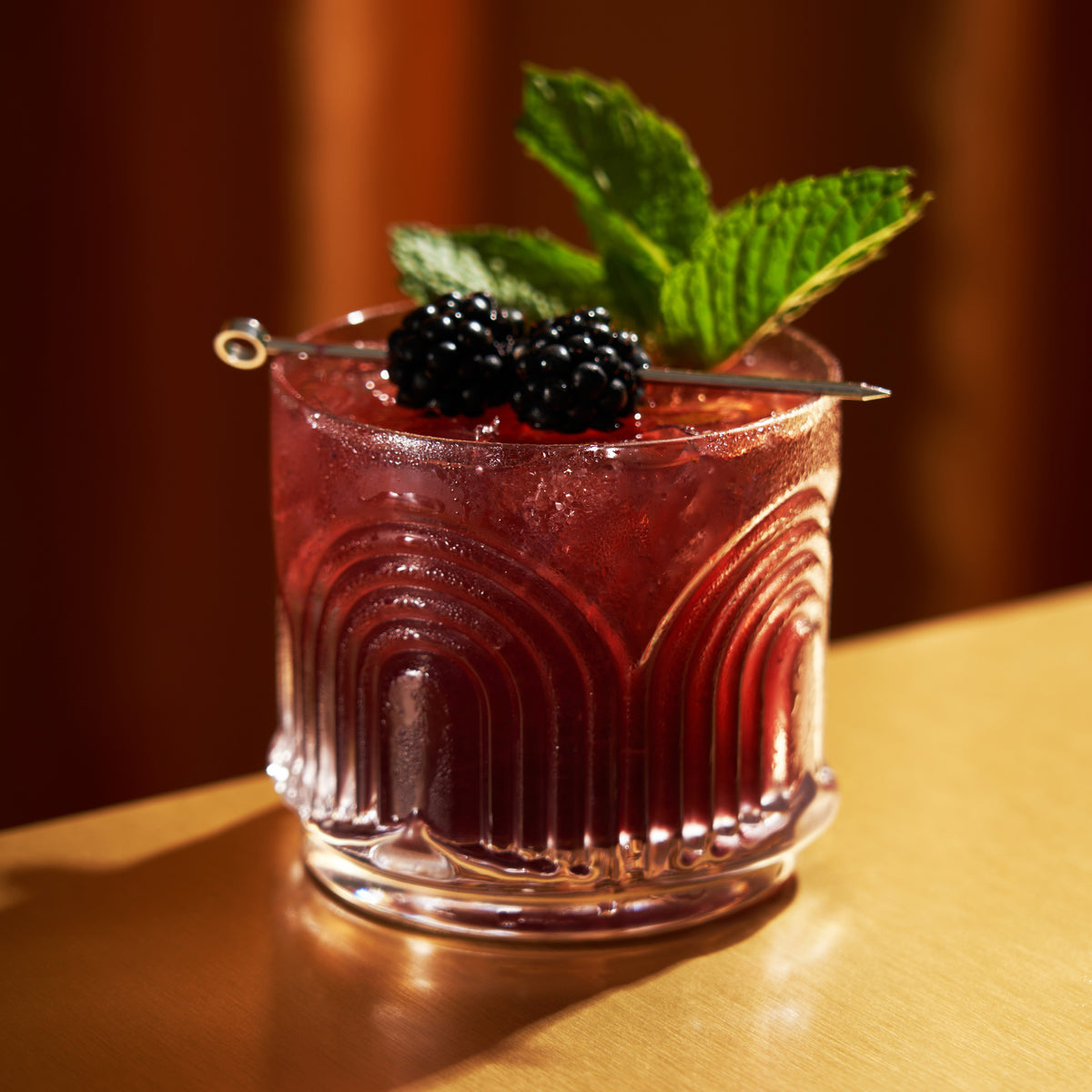 Beau Crystal lowball tumbler with red cocktail, mint and blackberry garnish on Tampa Home & Garden Store