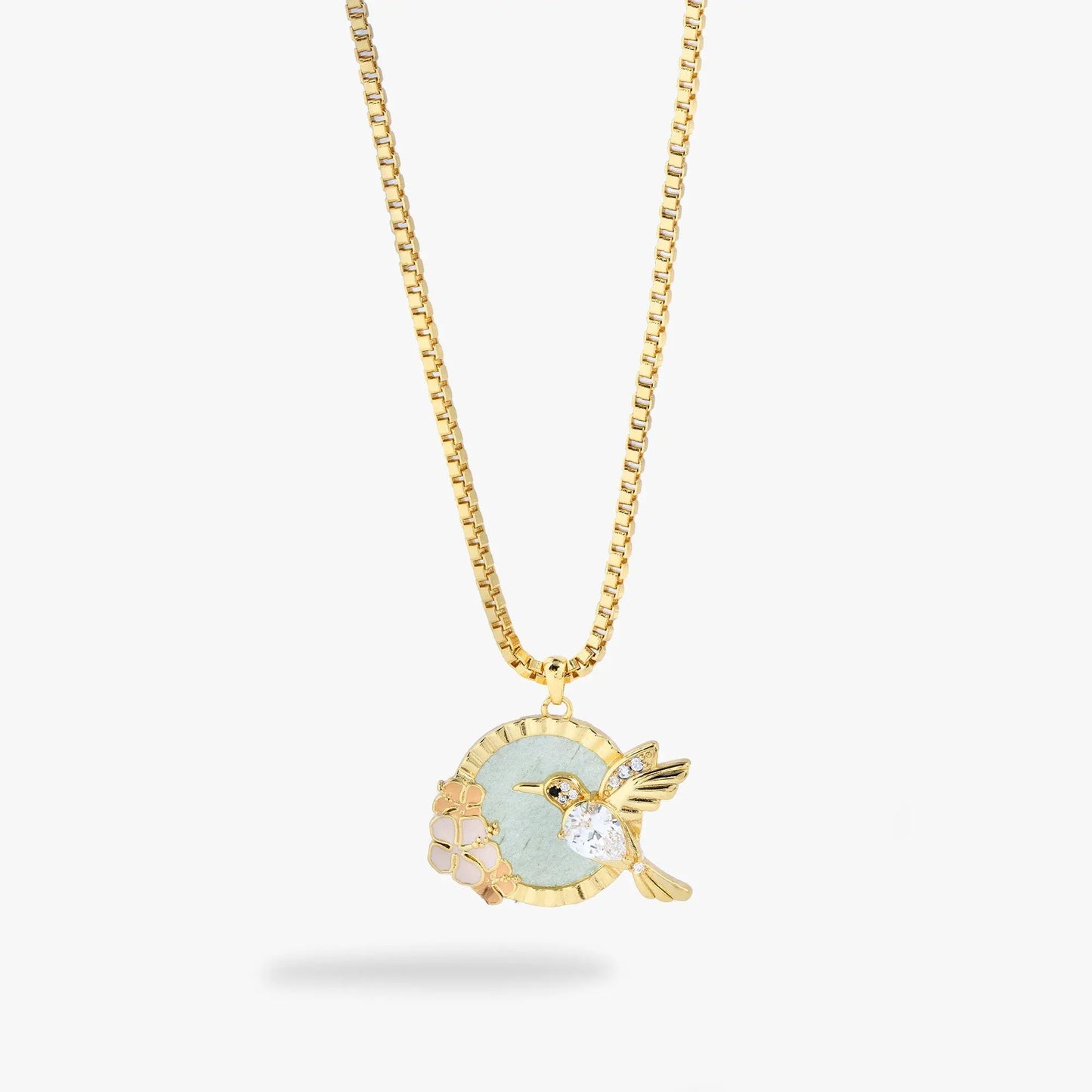 Hummingbird gemstone pendant necklace with gold-tone chain and mint stone accents on Tampa Home & Garden Store