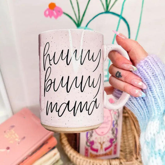 Gia Roma Hunny Bunny 16.23oz coffee mug, speckled ceramic with black script, held by hand on Tampa Home & Garden Store