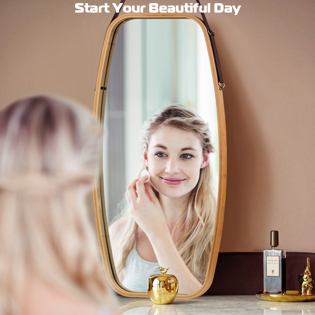 Wooden-framed bathroom mirror reflecting a woman applying makeup DirectDeals on Tampa Home & Garden Store