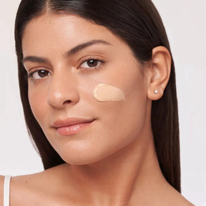 Alastin HydraTint Pro Mineral Broad Spectrum Sunscreen SPF 36 swatch on cheek, beige tint on Tampa Home & Garden Store