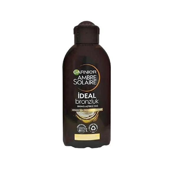 Garnier Ambre Solaire coconut tanning oil bottle in dark brown packaging on Tampa Home & Garden Store