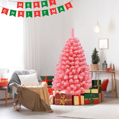 Pink Christmas tree with snow-flocked PVC tips and metal stand in a bright living room on Tampa Home & Garden Store