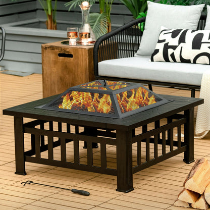 32in outdoor square fire pit table by GemGear with black metal frame and flickering flames on deck on Tampa Home & Garden Store