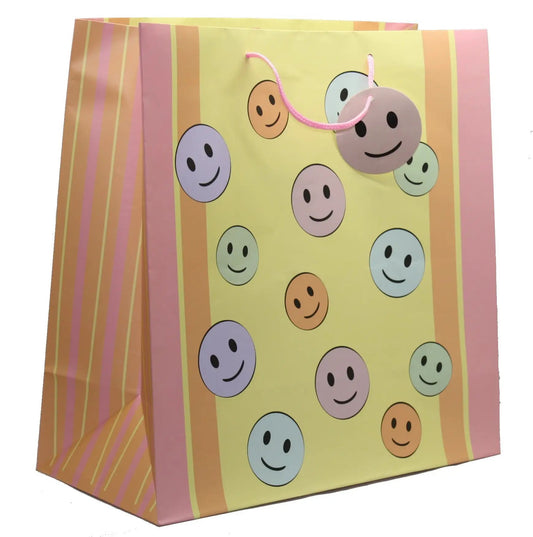 3 Piece Value Smiley Face Gift Bag Set yellow gift bags with multicolor smiley faces and pink rope handles by The Country Christmas Loft Gift Bags on Tampa Home & Garden Store