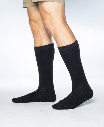 ICE Sock knee-high black military/tactical socks worn on legs, two-sock display on Tampa Home & Garden Store