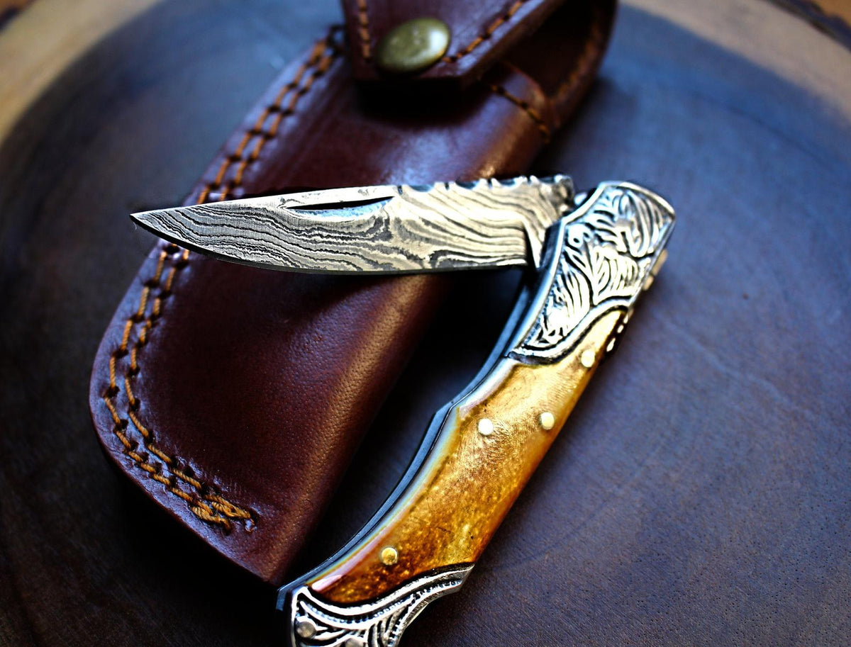 Damascus steel pocket knife with burn bone handle and steel bolsters TF-30 Titan International K on Tampa Home & Garden Store