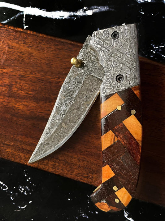 Custom Checkered Titan folding knife with raindrop Damascus blade and walnut scales on Tampa on Tampa Home & Garden Store