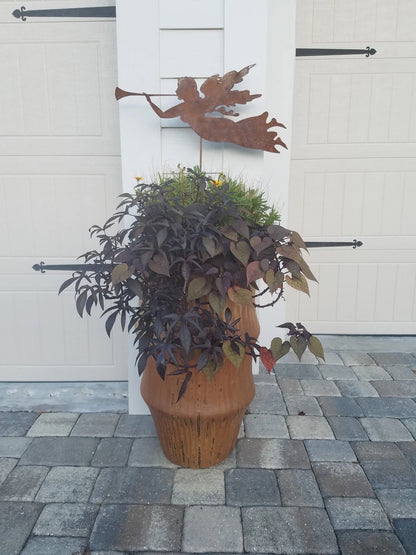 Angel garden stake metal silhouette in rusty finish with trumpet, Rustica Ornamentals decor on Tampa Home & Garden Store