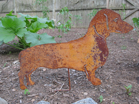 Dachshund lawn ornament statue in rusted metal with weathered finish on Tampa Home & Garden Store
