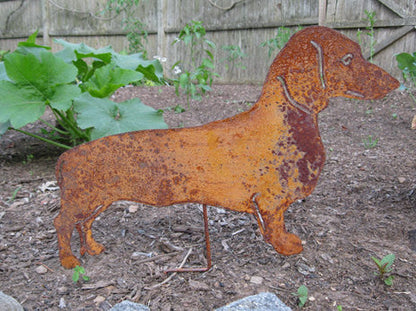 Dachshund lawn ornament statue in rusted metal with weathered finish on Tampa Home & Garden Store