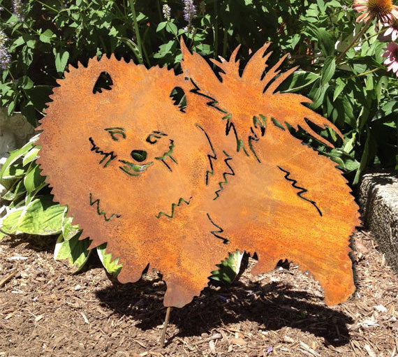Pomeranian garden stake two-dog metal sculpture in rust orange by Rustica Ornamentals on Tampa Home & Garden Store