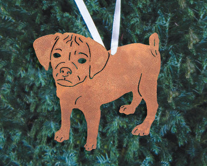 Puggle plant stake rusted metal dog silhouette with white ribbon on evergreen hedge on Tampa Home & Garden Store