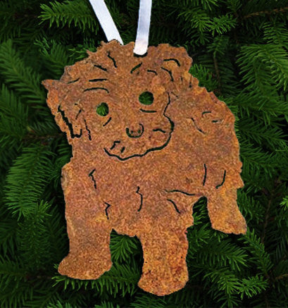 Maltese dog plant stake, rustic rusty metal cutout with white ribbon among evergreen branches on Tampa Home & Garden Store