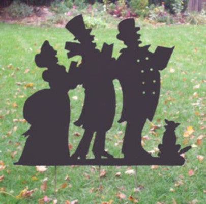Christmas caroling silhouette yard art by Rustica Ornamentals with figures in top hats and a cat on Tampa Home & Garden Store