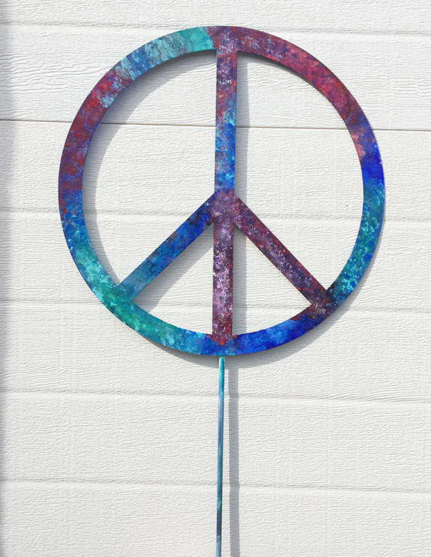Outdoor peace sign wall art by Rustica Ornamentals, rainbow gradient metal lawn stake on Tampa Home & Garden Store