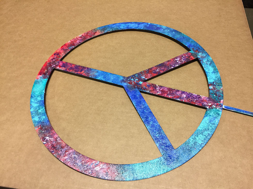 Outdoor peace sign garden sculpture in colorful speckled metal stake by Rustica Ornamentals on Tampa Home & Garden Store