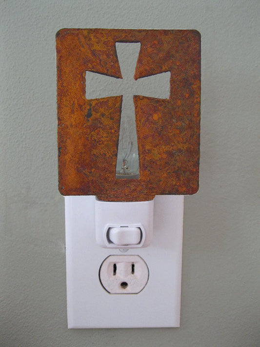 Cross Night Light Rustica Ornamentals with rusted cross panel over plug-in night light on Tampa Home & Garden Store