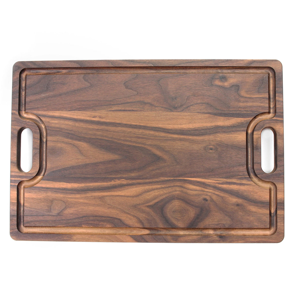 Cutting board by Refine Kitchenware in walnut wood with integrated oval handles on Tampa Home & Garden Store