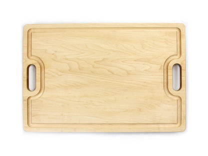 Cutting board by Refine Kitchenware in light wood with integrated side handle cutouts on Tampa Home & Garden Store