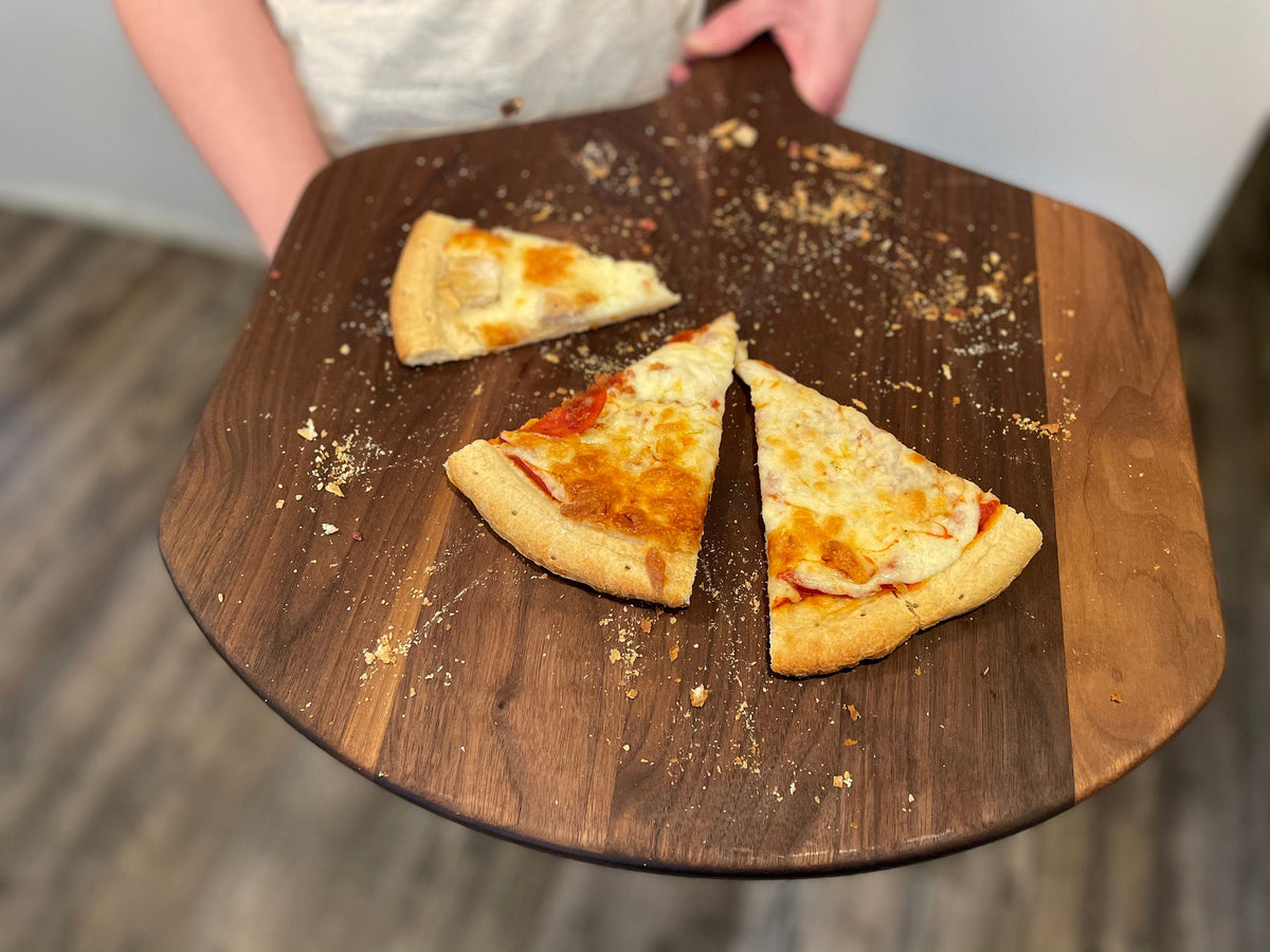 Personalized pizza peel in walnut American hardwood 22x16 with pizza slices on Tampa Home & Garden Store