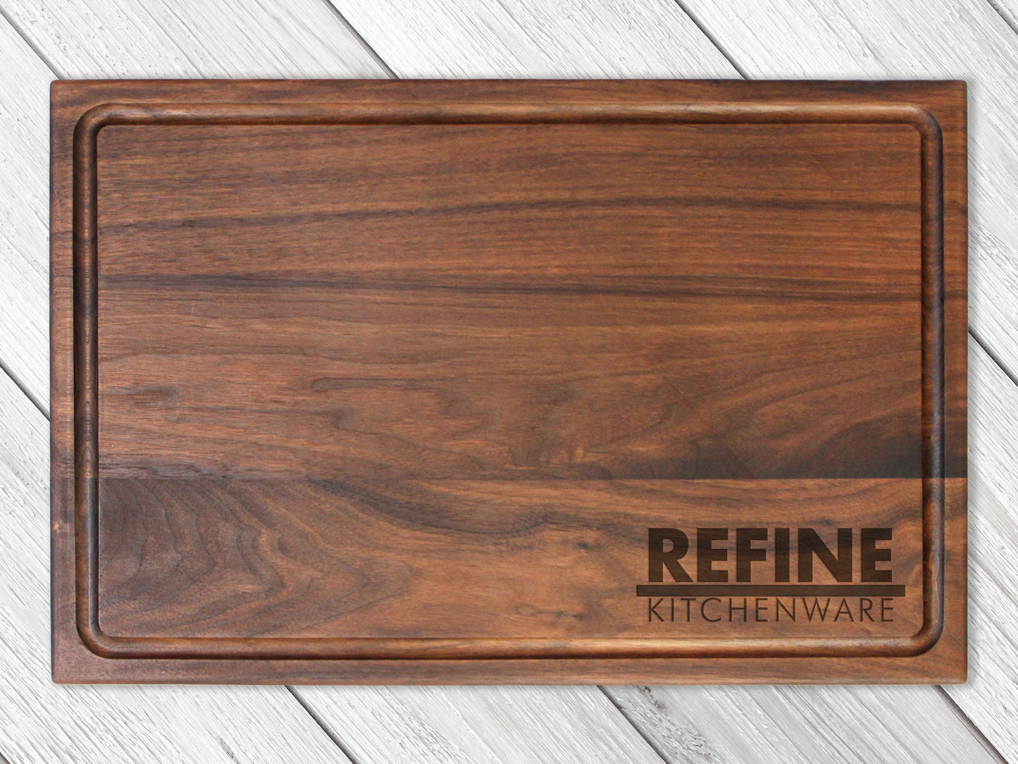 Wooden custom logo cutting board by Refine Kitchenware, engraved company logo, USA made on Tampa Home & Garden Store