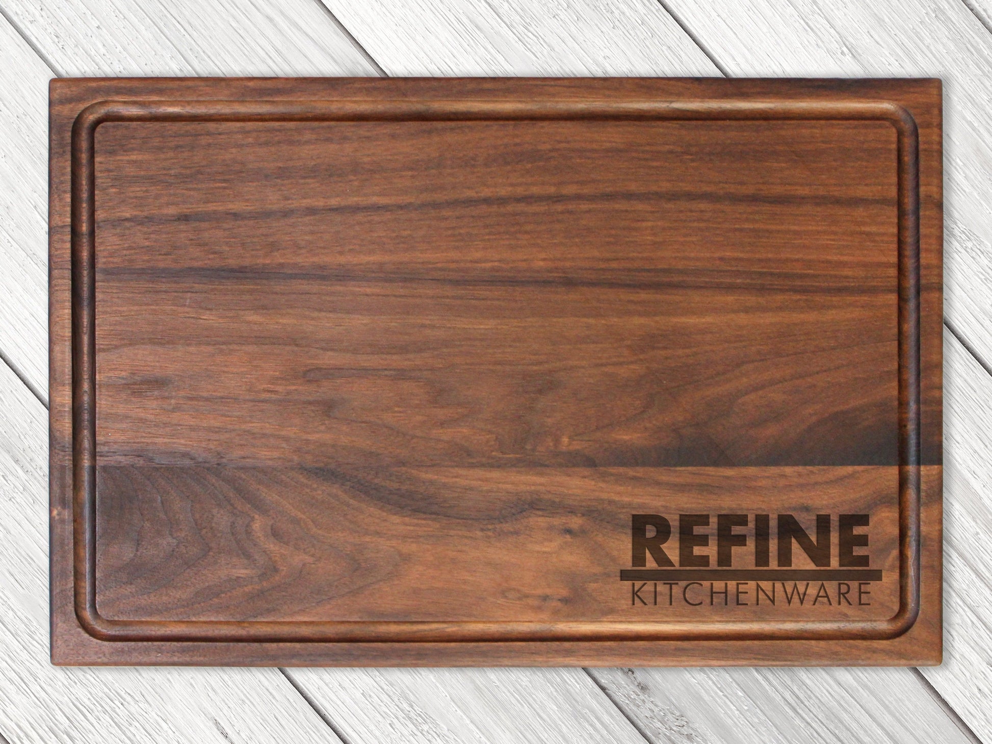 Wooden custom logo cutting board by Refine Kitchenware, engraved company logo, USA made on Tampa Home & Garden Store