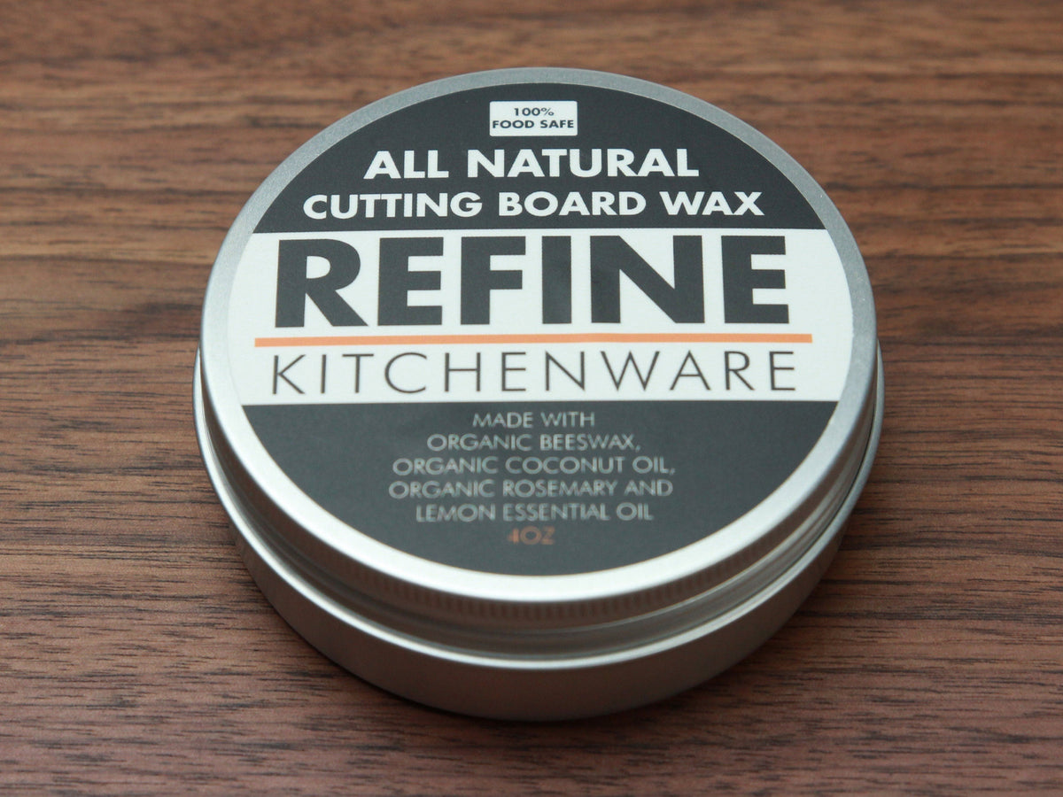 All natural cutting board wax tin by Refine Kitchenware with REFINE logo on wood surface on Tampa Home & Garden Store