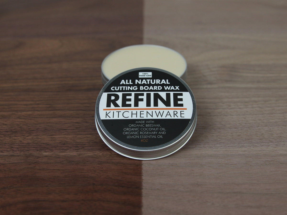 Refine Kitchenware All Natural Cutting Board Wax tin with pale cream wax, open lid on wood top on Tampa Home & Garden Store