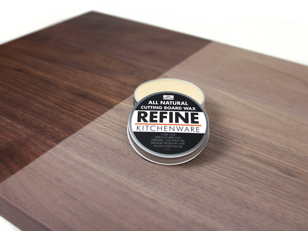 Refine Kitchenware All Natural Cutting Board Wax tin on dark wood cutting board on Tampa Home & Garden Store