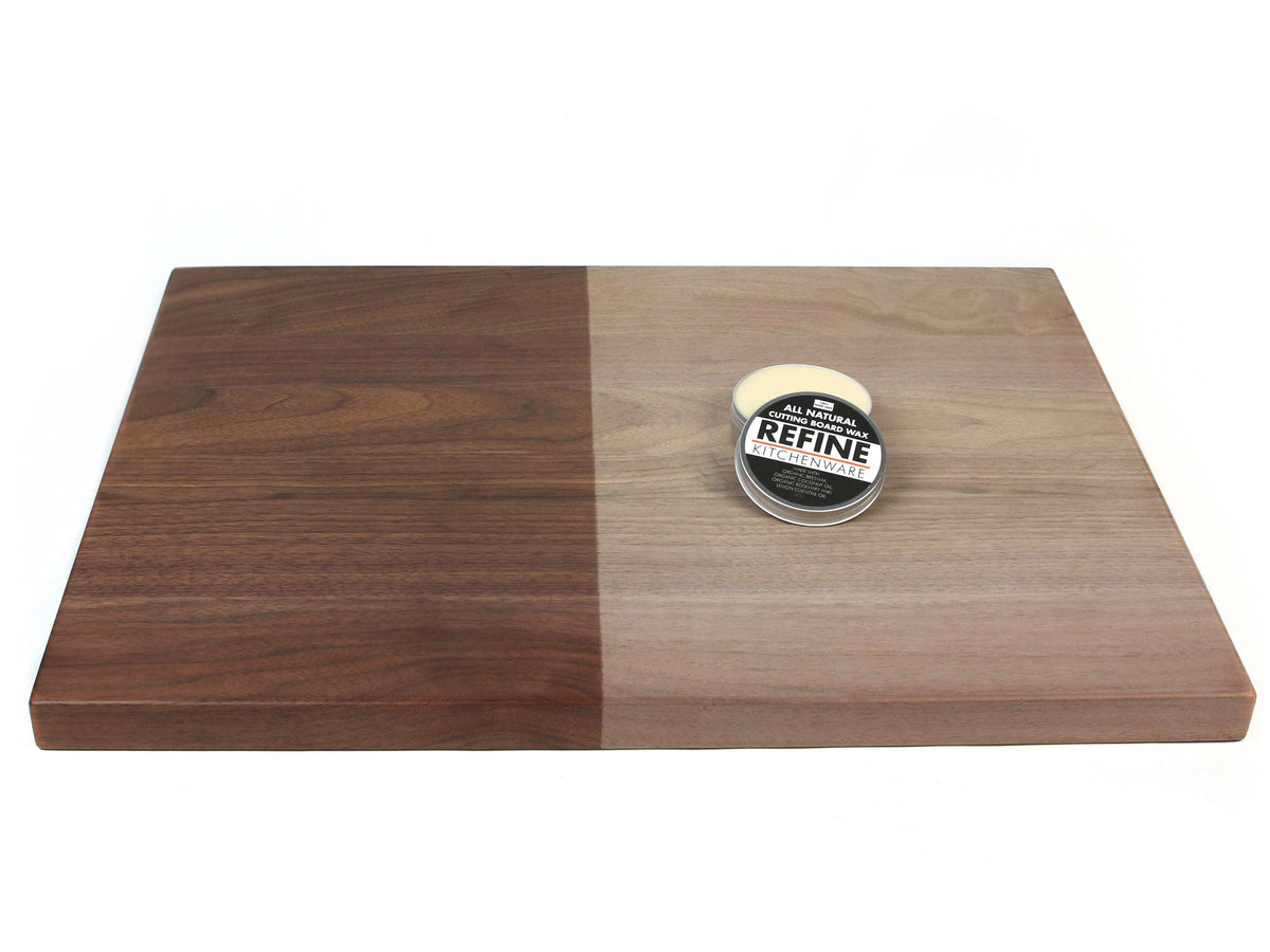 All Natural Cutting Board Wax tin by Refine Kitchenware on a two-tone wooden cutting board on Tampa Home & Garden Store