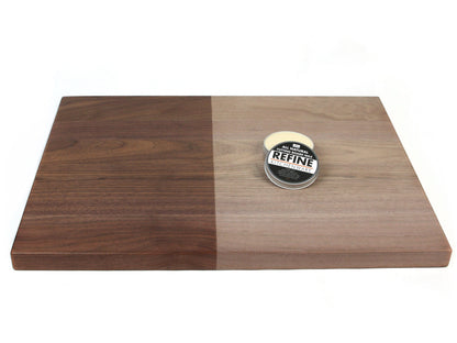 All Natural Cutting Board Wax tin by Refine Kitchenware on a two-tone wooden cutting board on Tampa Home & Garden Store