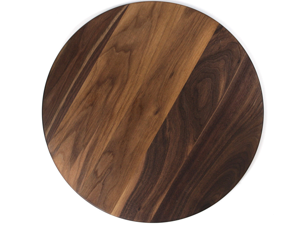 Round walnut cutting board by Refine Kitchenware with striped grain on Tampa Home & Garden Store