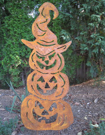 Three stacked pumpkins rusted orange metal yard decor with witch hat by Rustica Ornamentals on Tampa Home & Garden Store