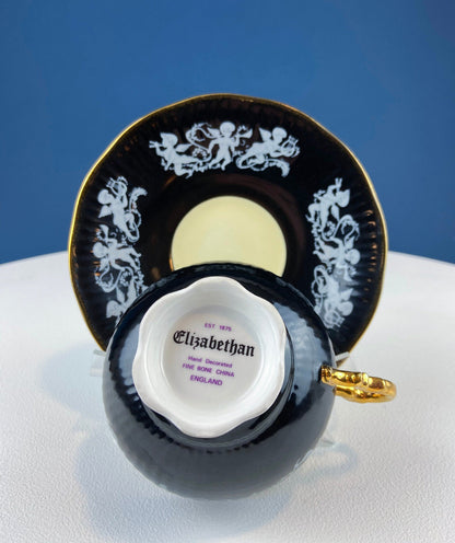 Tasse et soucoupe en porcelaine fine élisabéthaine vintage : Cupidons peints à la main