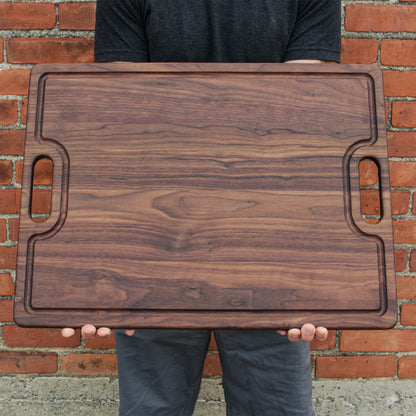 Extra Large Walnut Cutting Board with juice groove and carved side handles on Tampa Home & Garden Store