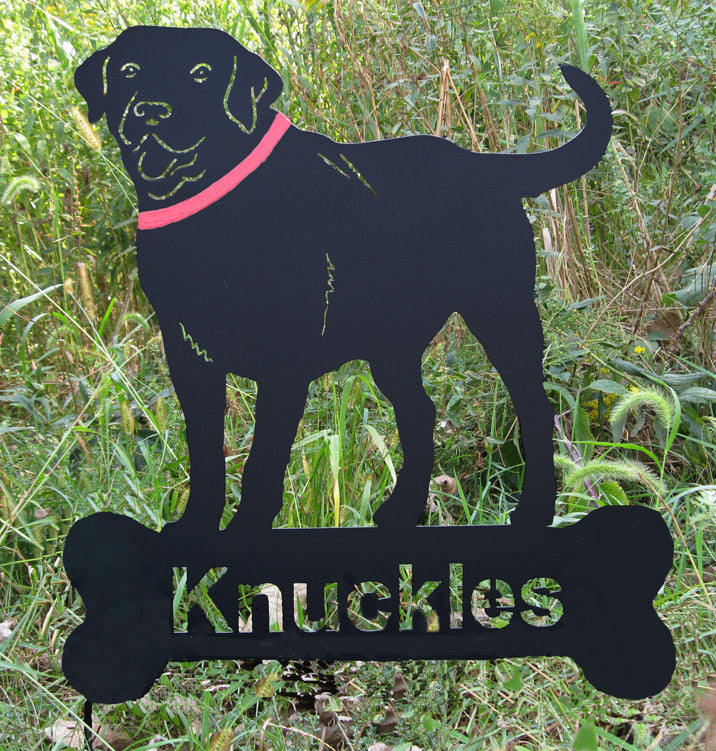 Black Labrador statue with pink collar on bone-shaped base Knuckles by Rustica Ornamentals on Tampa Home & Garden Store