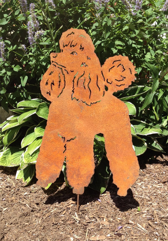 Rusty metal poodle sculpture lawn ornament garden stake on Tampa Home & Garden Store