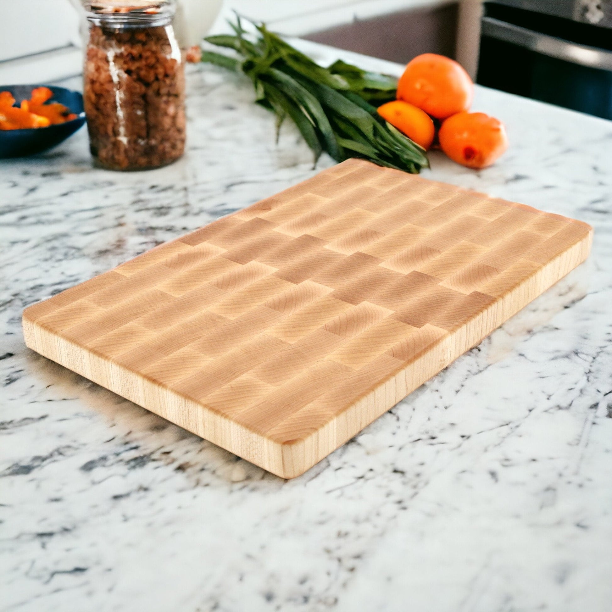 Maple large end grain cutting board on marble countertop on Tampa Home & Garden Store