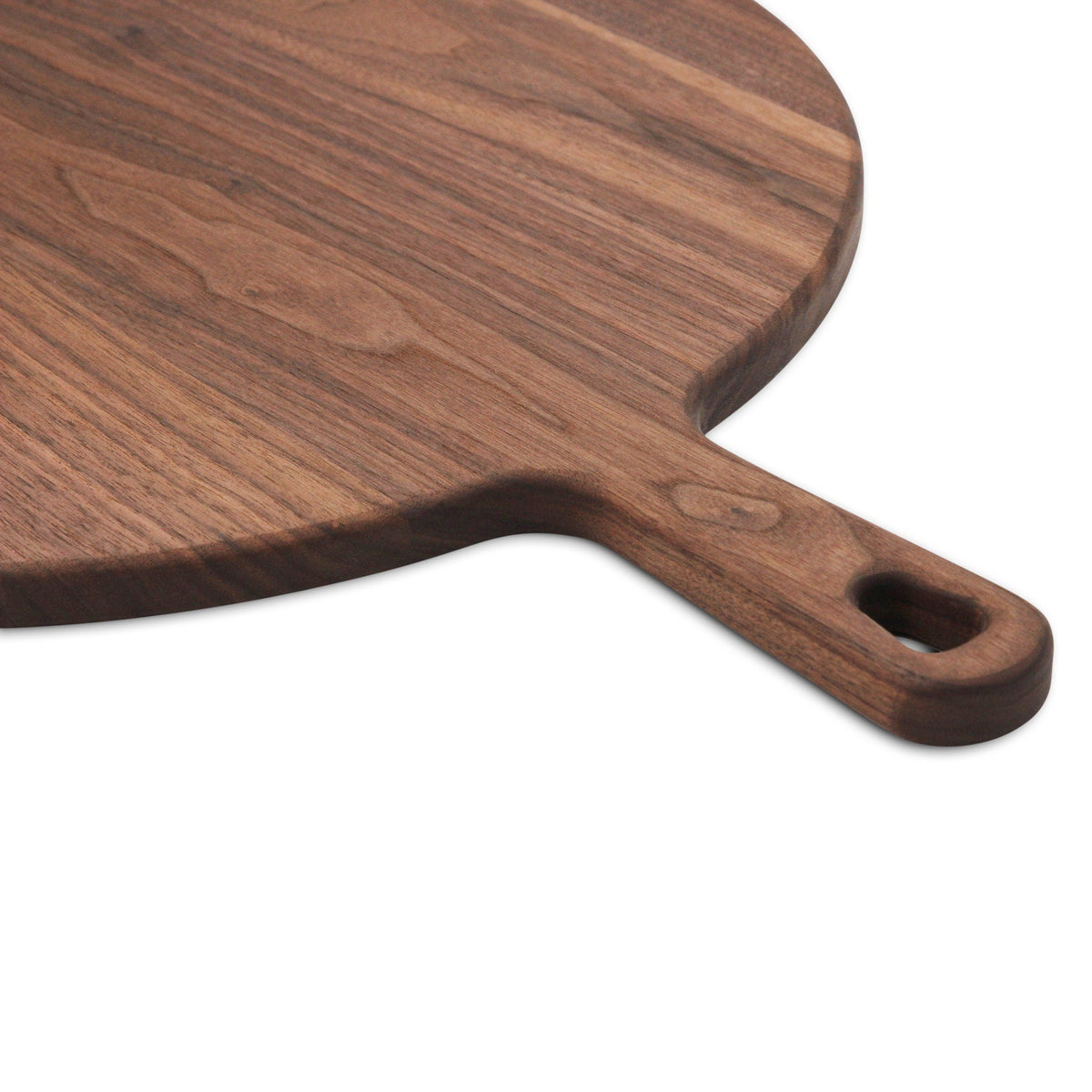XL walnut paddle cutting board with handle, round charcuterie board by Refine Kitchenware on Tampa Home & Garden Store