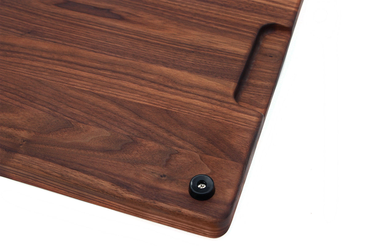 Wood cutting board with feet and juice groove, dark walnut finish, rounded edge on Tampa Home & Garden Store
